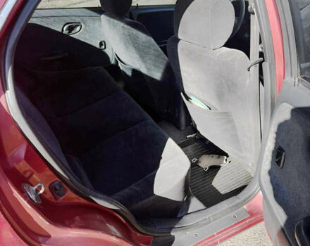 Красный Сузуки Балеро, объемом двигателя 1.6 л и пробегом 378 тыс. км за 1550 $, фото 6 на Automoto.ua