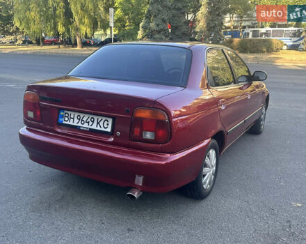 Червоний Сузукі Балеро, об'ємом двигуна 1.59 л та пробігом 180 тис. км за 1999 $, фото 11 на Automoto.ua