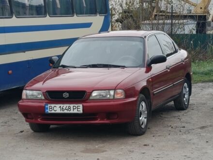 Красный Сузуки Балеро, объемом двигателя 1.6 л и пробегом 297 тыс. км за 2400 $, фото 1 на Automoto.ua