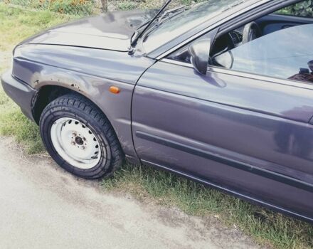 Серый Сузуки Балеро, объемом двигателя 1.3 л и пробегом 387 тыс. км за 1000 $, фото 8 на Automoto.ua