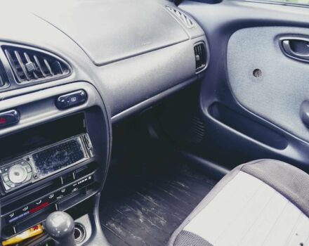 Серый Сузуки Балеро, объемом двигателя 1.3 л и пробегом 387 тыс. км за 1000 $, фото 1 на Automoto.ua