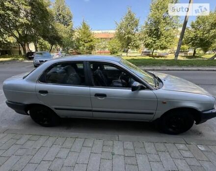 Серый Сузуки Балеро, объемом двигателя 1.3 л и пробегом 200 тыс. км за 1199 $, фото 1 на Automoto.ua