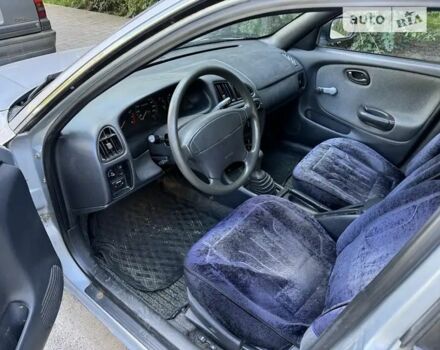 Серый Сузуки Балеро, объемом двигателя 1.3 л и пробегом 200 тыс. км за 1199 $, фото 5 на Automoto.ua