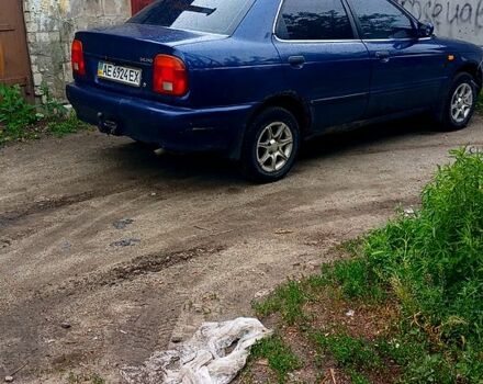 Синий Сузуки Балеро, объемом двигателя 1.3 л и пробегом 300 тыс. км за 1200 $, фото 1 на Automoto.ua