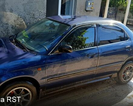 Синий Сузуки Балеро, объемом двигателя 1.3 л и пробегом 300 тыс. км за 2200 $, фото 1 на Automoto.ua