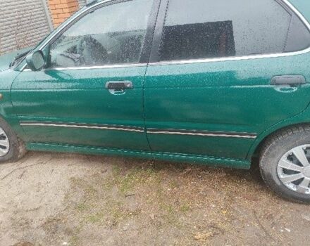 Зеленый Сузуки Балеро, объемом двигателя 1.3 л и пробегом 90 тыс. км за 2381 $, фото 1 на Automoto.ua