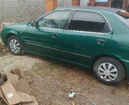 Зеленый Сузуки Балеро, объемом двигателя 1.3 л и пробегом 90 тыс. км за 2381 $, фото 2 на Automoto.ua