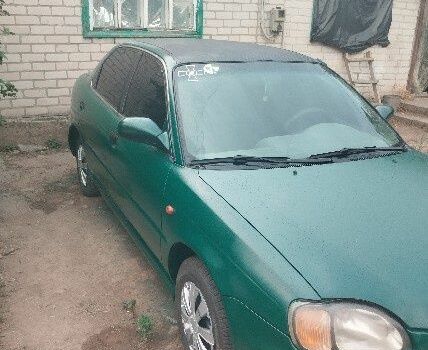 Зеленый Сузуки Балеро, объемом двигателя 1.3 л и пробегом 90 тыс. км за 2381 $, фото 3 на Automoto.ua