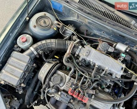 Зеленый Сузуки Балеро, объемом двигателя 1.6 л и пробегом 280 тыс. км за 1000 $, фото 15 на Automoto.ua