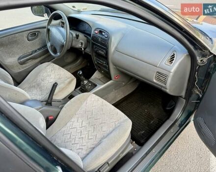 Зеленый Сузуки Балеро, объемом двигателя 1.6 л и пробегом 280 тыс. км за 1000 $, фото 8 на Automoto.ua