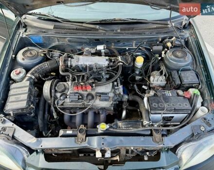 Зеленый Сузуки Балеро, объемом двигателя 1.6 л и пробегом 280 тыс. км за 1000 $, фото 13 на Automoto.ua