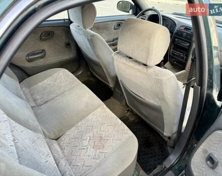 Зеленый Сузуки Балеро, объемом двигателя 1.6 л и пробегом 280 тыс. км за 1000 $, фото 9 на Automoto.ua