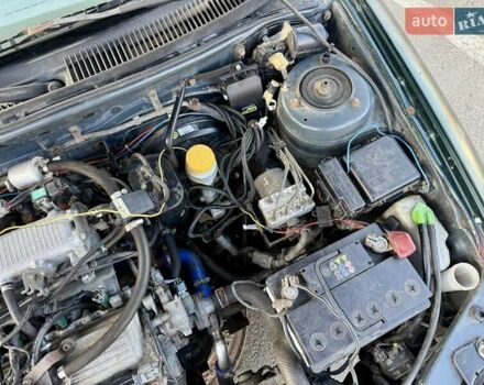 Зеленый Сузуки Балеро, объемом двигателя 1.6 л и пробегом 280 тыс. км за 1000 $, фото 14 на Automoto.ua