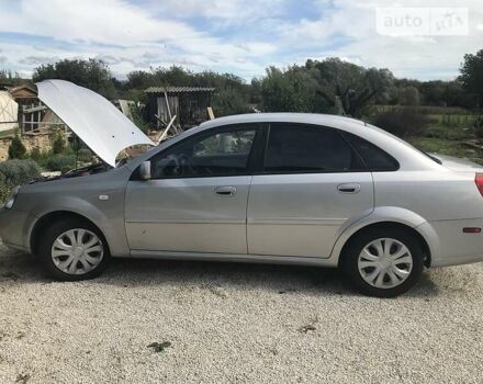 Сірий Сузукі Форенза, об'ємом двигуна 2 л та пробігом 120 тис. км за 3500 $, фото 2 на Automoto.ua