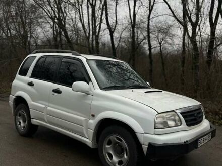 Белый Сузуки Гранд Витара, объемом двигателя 2 л и пробегом 235 тыс. км за 4200 $, фото 1 на Automoto.ua