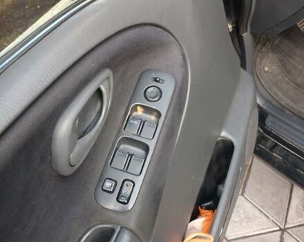 Чорний Сузукі Гранд Вітара, об'ємом двигуна 2 л та пробігом 227 тис. км за 5600 $, фото 6 на Automoto.ua