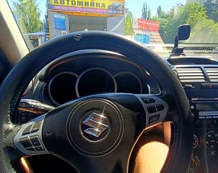 Черный Сузуки Гранд Витара, объемом двигателя 2 л и пробегом 227 тыс. км за 8000 $, фото 2 на Automoto.ua