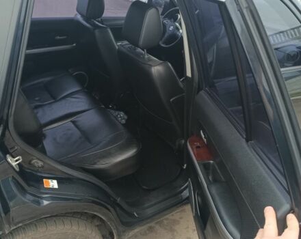 Черный Сузуки Гранд Витара, объемом двигателя 2 л и пробегом 281 тыс. км за 8100 $, фото 2 на Automoto.ua