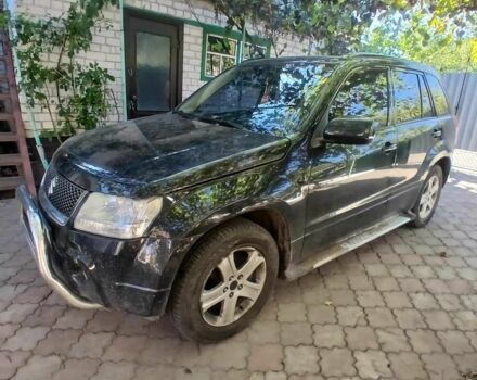 Черный Сузуки Гранд Витара, объемом двигателя 2 л и пробегом 210 тыс. км за 5800 $, фото 1 на Automoto.ua
