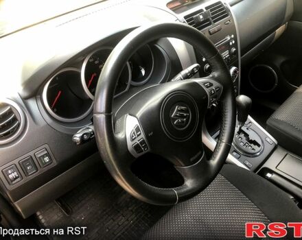 Черный Сузуки Гранд Витара, объемом двигателя 2 л и пробегом 265 тыс. км за 8500 $, фото 1 на Automoto.ua