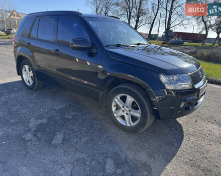 Черный Сузуки Гранд Витара, объемом двигателя 2 л и пробегом 230 тыс. км за 6800 $, фото 1 на Automoto.ua