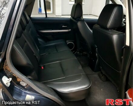 Черный Сузуки Гранд Витара, объемом двигателя 2 л и пробегом 235 тыс. км за 7500 $, фото 5 на Automoto.ua