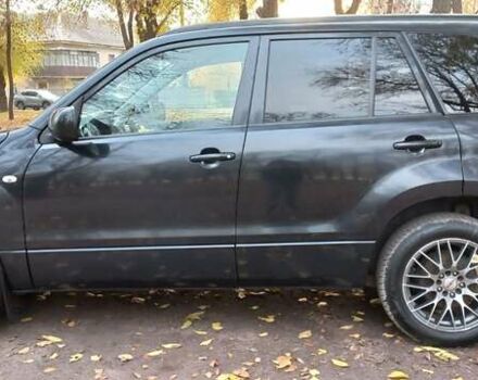 Черный Сузуки Гранд Витара, объемом двигателя 2 л и пробегом 218 тыс. км за 7800 $, фото 5 на Automoto.ua