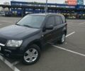 Чорний Сузукі Гранд Вітара, об'ємом двигуна 2 л та пробігом 251 тис. км за 7000 $, фото 1 на Automoto.ua