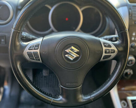 Чорний Сузукі Гранд Вітара, об'ємом двигуна 2 л та пробігом 209 тис. км за 7500 $, фото 12 на Automoto.ua