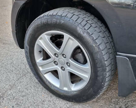 Чорний Сузукі Гранд Вітара, об'ємом двигуна 2 л та пробігом 245 тис. км за 5500 $, фото 9 на Automoto.ua