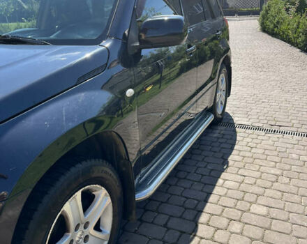 Чорний Сузукі Гранд Вітара, об'ємом двигуна 2 л та пробігом 260 тис. км за 7900 $, фото 22 на Automoto.ua