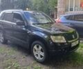 Чорний Сузукі Гранд Вітара, об'ємом двигуна 2 л та пробігом 130 тис. км за 8200 $, фото 1 на Automoto.ua