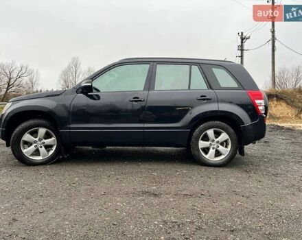 Черный Сузуки Гранд Витара, объемом двигателя 2.39 л и пробегом 289 тыс. км за 9500 $, фото 2 на Automoto.ua