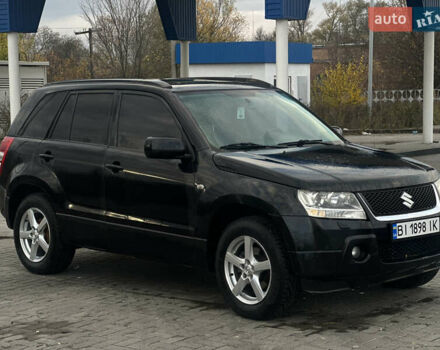 Черный Сузуки Гранд Витара, объемом двигателя 2 л и пробегом 235 тыс. км за 10500 $, фото 2 на Automoto.ua