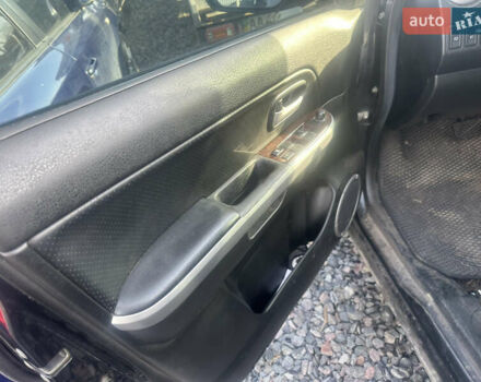 Черный Сузуки Гранд Витара, объемом двигателя 2 л и пробегом 240 тыс. км за 2900 $, фото 12 на Automoto.ua