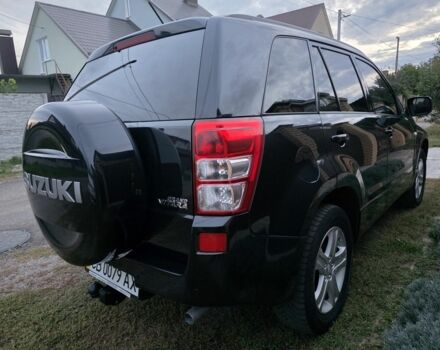 Чорний Сузукі Гранд Вітара, об'ємом двигуна 2 л та пробігом 150 тис. км за 10500 $, фото 11 на Automoto.ua