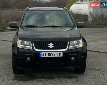 Черный Сузуки Гранд Витара, объемом двигателя 2 л и пробегом 235 тыс. км за 10500 $, фото 1 на Automoto.ua