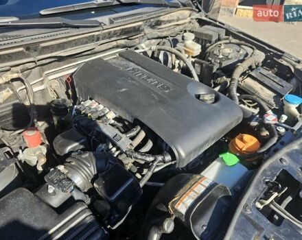 Черный Сузуки Гранд Витара, объемом двигателя 2.4 л и пробегом 175 тыс. км за 11500 $, фото 14 на Automoto.ua