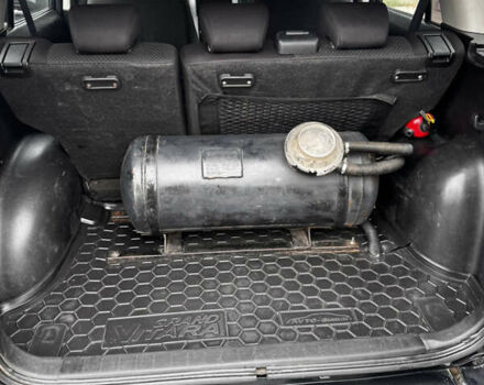 Черный Сузуки Гранд Витара, объемом двигателя 2.39 л и пробегом 211 тыс. км за 8600 $, фото 12 на Automoto.ua