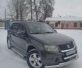 Черный Сузуки Гранд Витара, объемом двигателя 1.9 л и пробегом 230 тыс. км за 9650 $, фото 1 на Automoto.ua