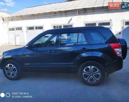 Черный Сузуки Гранд Витара, объемом двигателя 2.39 л и пробегом 181 тыс. км за 12000 $, фото 3 на Automoto.ua