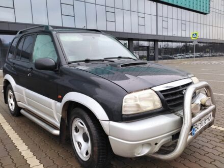 Чорний Сузукі Гранд Вітара, об'ємом двигуна 2 л та пробігом 299 тис. км за 5600 $, фото 1 на Automoto.ua