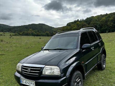 Черный Сузуки Гранд Витара, объемом двигателя 2 л и пробегом 210 тыс. км за 7200 $, фото 1 на Automoto.ua