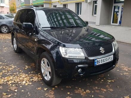 Черный Сузуки Гранд Витара, объемом двигателя 2 л и пробегом 235 тыс. км за 7500 $, фото 1 на Automoto.ua