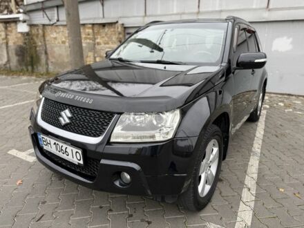 Черный Сузуки Гранд Витара, объемом двигателя 2.4 л и пробегом 135 тыс. км за 8100 $, фото 1 на Automoto.ua