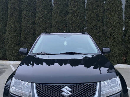 Черный Сузуки Гранд Витара, объемом двигателя 2 л и пробегом 100 тыс. км за 9800 $, фото 1 на Automoto.ua