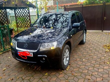 Черный Сузуки Гранд Витара, объемом двигателя 2 л и пробегом 211 тыс. км за 7000 $, фото 1 на Automoto.ua