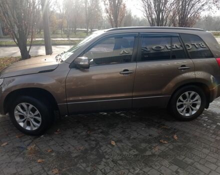 Коричневый Сузуки Гранд Витара, объемом двигателя 2.4 л и пробегом 140 тыс. км за 14000 $, фото 2 на Automoto.ua