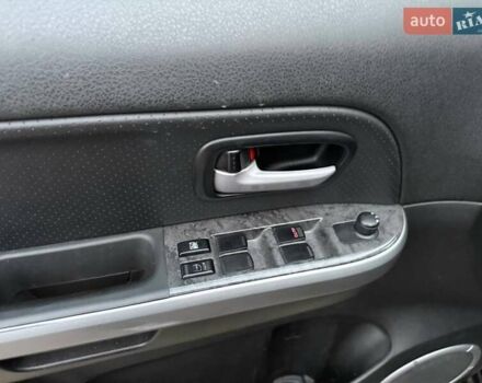 Коричневый Сузуки Гранд Витара, объемом двигателя 2.39 л и пробегом 227 тыс. км за 12490 $, фото 14 на Automoto.ua