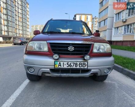 Красный Сузуки Гранд Витара, объемом двигателя 2 л и пробегом 321 тыс. км за 5500 $, фото 1 на Automoto.ua
